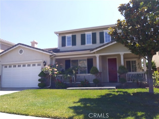 1702 Partridge Avenue Upland, California Beautiful home, quiet neighborhood, and a great location in Colonies. If you love space for entertaining, this is your house. Move in condition. Covered porch in the front and on the side of the house, used as sitting area. Receiving area from the front door. High ceiling in the Living Room, Formal Dining Room, Huge Kitchen with an island, corian countertops, filtered drinking faucet, pantry, and lots of cabinets. Additional dining area leading to Family Room with aquarium and fireplace. Master bedroom downstairs has Jacuzzi bathtub and his & her closets. Three bedroom upstairs and a loft used as office, den/recreation that can be the 5th bedroom. Hardwood flooring and tile in the toilet. Plantation shutters window coverings, built in cabinets, water softener, and a lot more to mention. No neighbors in the back for privacy and with mountain view. Close to Colonies shopping centers, Golf Course, hiking trails, Mt. Baldy, and 210 Freeway.