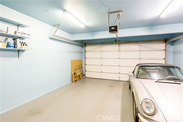 No, you cannot take the porche for a spin... but you may use the garage and keep your own porsche in this private attached garage!