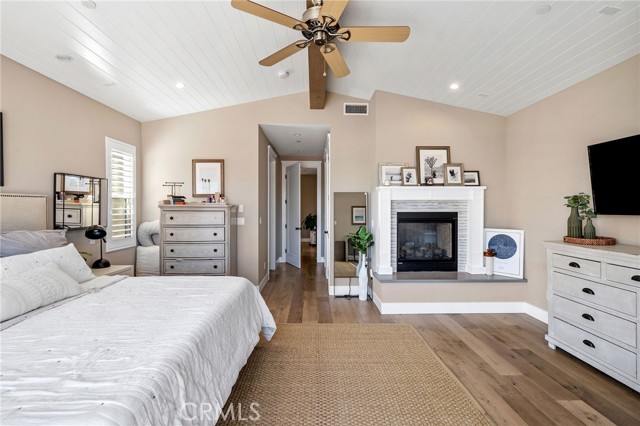 Primary bedroom with dual fireplace