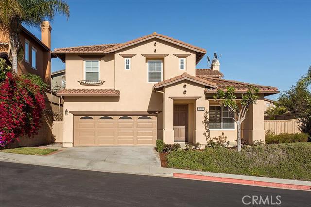 Front of home with 3 car garage