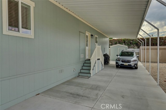 COVERED CARPORT, LENGTHY AND EXTRA WIDE