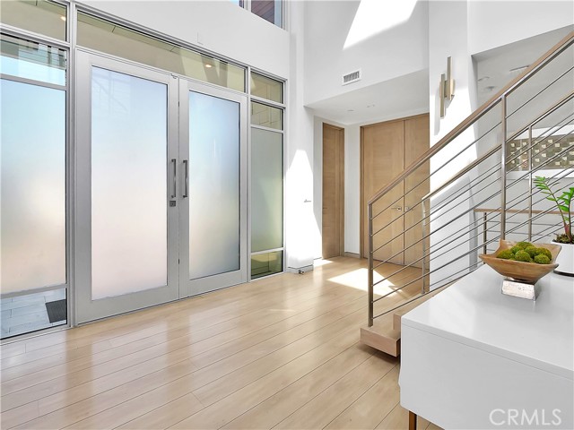 Light and bright 2 story entryway.