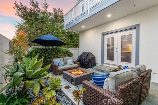 Relax in the succulent-lined back patio to enjoy sunsets & BBQ with friends.