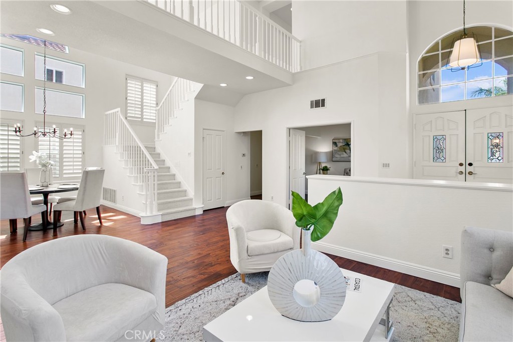 Welcome to your dream home in the quiet and serene community of Vista Monte in Laguna Niguel. With one of the largest lots in the tract, a spacious 6,500 square foot lot, this stunning single-family home boasts 5 bedrooms, 3 baths, and a host of impressive features that will capture your heart. As you step inside, you'll be greeted by the bright and airy open floor plan that spans two stories, creating a sense of spaciousness throughout the home. The meticulously designed layout allows for seamless transitions between the living, dining, and kitchen areas, perfect for entertaining guests or spending quality time with loved ones. The home is adorned with recessed lighting, creating a warm and inviting ambiance, while the upgrades such as new kitchen appliances and flooring elevate the overall aesthetic. The primary bedroom offers a private retreat, complete with a beautifully crafted vanity and a replaced deck where you can unwind and enjoy tranquil moments. Additionally, the entire home has been repiped with ‘PLEX’ plumbing for your peace of mind. Outside, a charming wrought iron fence encloses the property, providing both security and a touch of elegance. The backyard has been thoughtfully landscaped with a new sod installation, offering a perfect space for outdoor activities, or simply basking in the sunshine. And if you're a car enthusiast or have a growing family, the three-car garage provides ample parking and storage options. One of the most captivating aspects of this home is the breathtaking views it offers. With peek-a-boo glimpses of the ocean, you'll find yourself immersed in the beauty of your surroundings. The community amenities in Vista Monte are sure to enhance your lifestyle. Take advantage of the low HOA dues, which provide access to a picnic area, playground, tennis courts, and biking trails. You can savor delicious meals with family and friends at the BBQ area or spend your weekends exploring the scenic biking trails nearby.