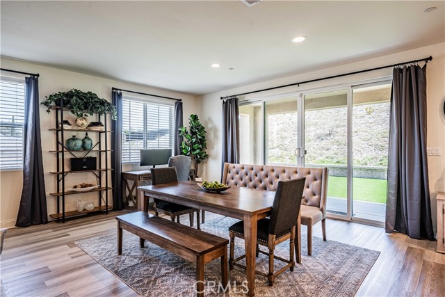 Dining room space right before your pocket doors to the patio outside. New astro turf was just installed outside for a no mowing lawn!