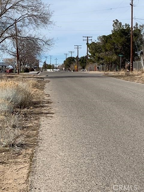 Front of Lot next door between PIQ and School