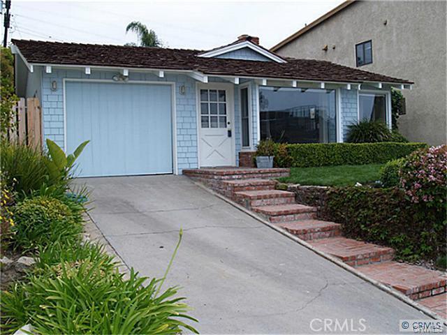 33782 Colegio Drive Dana Point, California Exceptional lease opportunity in Dana Point!! Fantastic single family beach home with large lot and Ocean views!! Light and bright, open and spacious floor plan has a living room area with brick fireplace and wood beamed vaulted ceilings!! Upgraded with cherry wood floors, vinyl windows and bath with pedestal sinks! 1 car attached garage with direct access! Super large rear yard with slab patio plus grass area is perfect for entertaining!! Utilities included not to exceed $200 per month!! Excellent location...walk to the beach, town harbor, shopping, dining and more!! This one is a must see...it will not last!