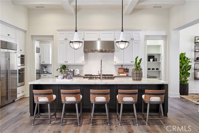 Kitchen bar area. This home also has two additional dining areas.
