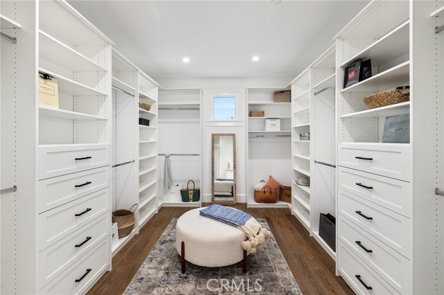 Enviable Boutique-Inspired Walk-in Closet. Wow!