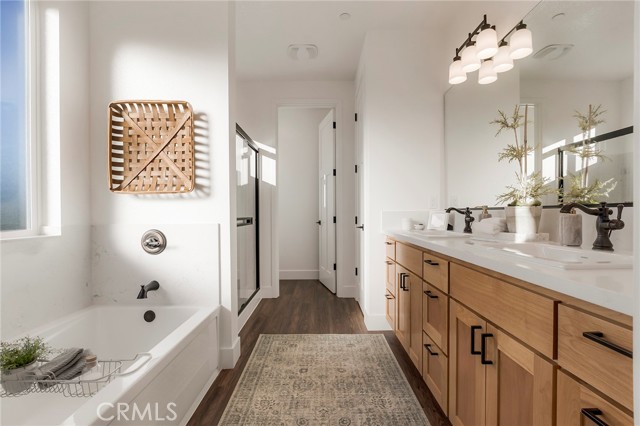 Quartz countertops, dual sinks and alder cabinets come standard