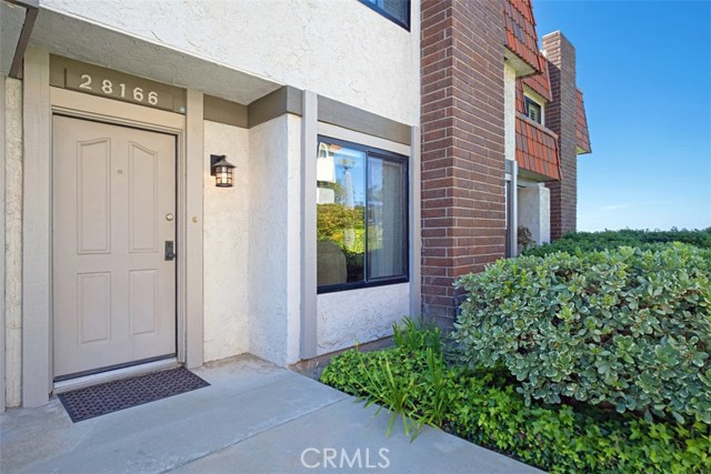 28166 Ridgecove Court Rancho Palos Verdes, California Enjoy ocean breezes and coastal views in Rancho Palos Verdes! First time on the market, this updated 3 bed and 2 1/2 bath townhome is nicely situated in the desirable Ridgegate Cove South. Light and bright living areas feature a stone fireplace, crown molding and laminated wood flooring. Kitchen has granite countertops, updated cabinets and newer appliances. Master bedroom has walk-in closet with built-ins, and both master and secondary bathrooms have been nicely updated. Partial ocean and city light viewEnjoy ocean breezes and coastal views in Rancho Palos Verdes! First time on the market, this updated 3 bed and 2 1/2 bath townhome is nicely situated in the desirable Ridgegate Cove South. Light and bright living areas feature a stone fireplace, crown molding and laminated wood flooring. Kitchen has granite countertops, updated cabinets and newer appliances. Master bedroom has walk-in closet with built-ins, and both master and secondary bathrooms have been nicely updated. Partial ocean and city light views from secondary bedrooms. Two-car garage includes washer/dryer hook ups, storage and access to private courtyard with mature lemon tree. Guard-gated with 24-hour security, this peaceful, beautifully landscaped community includes tennis courts and a well-appointed pool area with stunning panoramic views of the city and entire south bay coastline up to Malibu! Convenient to shopping and dining at the Promenade on the Peninsula. Hurry, this one won't last!