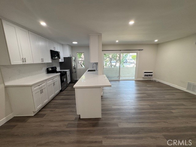 7730 Lexington Ave. #102, West Hollywood CA: https://media.crmls.org/medias/e3d43a23-75d9-473c-aa19-a2280fee2d76.jpg