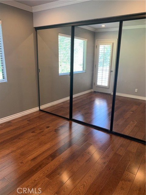 Bedroom #2 w/ triple mirrored closet doors