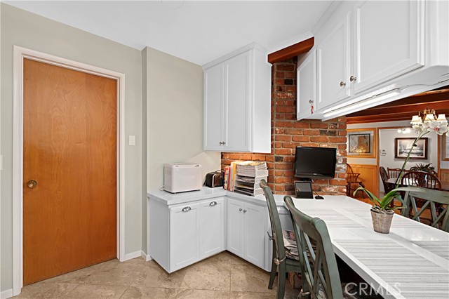 The laundry room is easily accessible from the kitchen