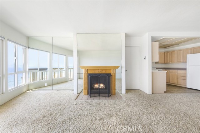 Sun-drenched Living Room w Fireplace