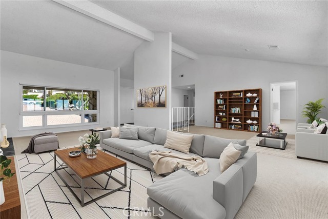 view of living room and sitting area virtually staged