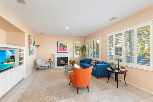 The family room features a spacious and open layout, ideal for gatherings and quality family time.