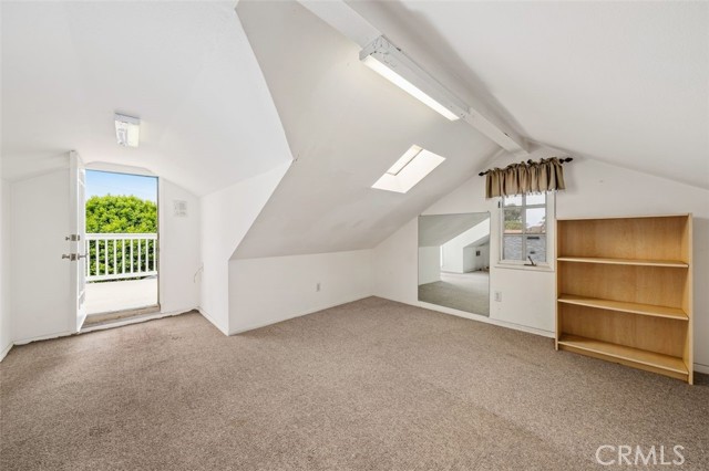 finished attic with standing room & door to roof deck