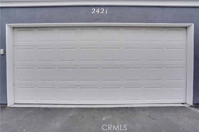 Combination entry pad to the left; automated garage door