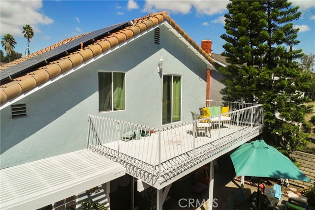 Spanish tile roof, Solar Panels, large upstairs balcony deck, A/C and more!