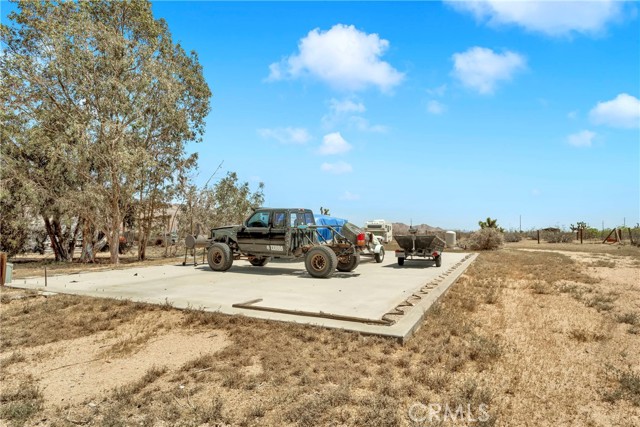 Large pad for parking or storage, or to place sheds or storage structure.