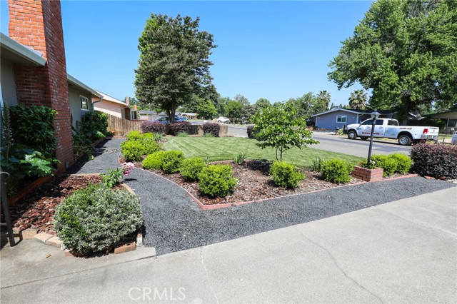 The graveled paths around the entire property, reduce your water use. You can save water and still enjoy your pretty flowers and green grass!