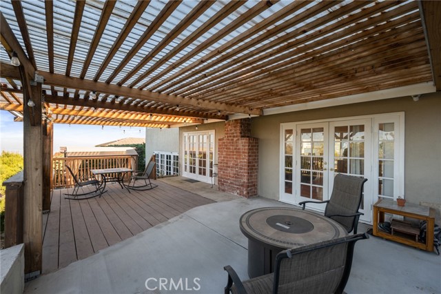 Deck one off the living room is not just an extension of the home; it's a vantage point to soak in the beauty of Los Angeles