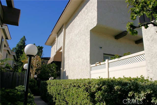 End unit with a custom awning.