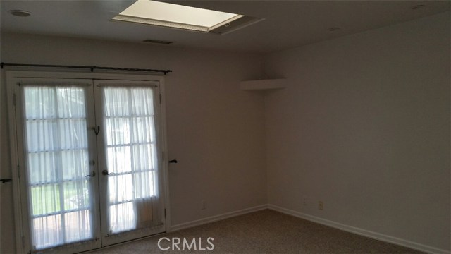 Master bedroom has French doors that lead to the patio