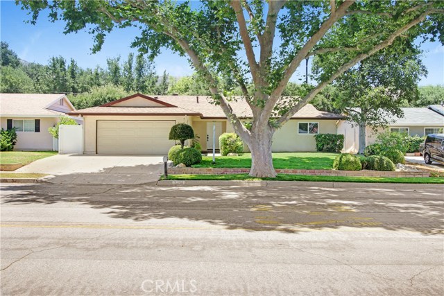 5394 Katherine Street Simi Valley, California This is the home your clients will fall in love with. This beautiful 4bedroom, 2 baths, and office/5th bedroom home has been completely remodeled and the living space reconfigured. The kitchen/living area has been opened up and is now the large family space your clients have been looking for. The master bath has been closed to the hallway and is now a private master bath. The list of upgrades is huge! All new windows, new soft close kitchen cabinets, new quartz countertops, beautiful matching backsplash in kitchen and bathrooms, all new appliances, new kitchen island with tons of storage and lots of seating area for the kids to eat at, and new fixtures throughout the home, new electrical panel, and wiring through the entire home. Stunning new waterproof woodlike laminate flooring throughout, new carpeting in all the bedrooms, new interior paint and baseboards, newly designed wood burning fireplace with matching kitchen counter quartz, new recessed lighting in the family area, new HVAC, new matching fans with lighting in each bedroom, and both bathrooms have all new cabinets, with new matching quartz countertops, new under countersinks, and the most amazing tiled showers you've ever seen with elegant glass enclosures. Outside we have new sod landscaping front and back, and a redone covered patio. This home is contemporary elegance at an affordable price. Please show your clients, you will not be disappointed.