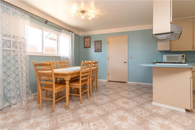 Dining Area Leads to Garage