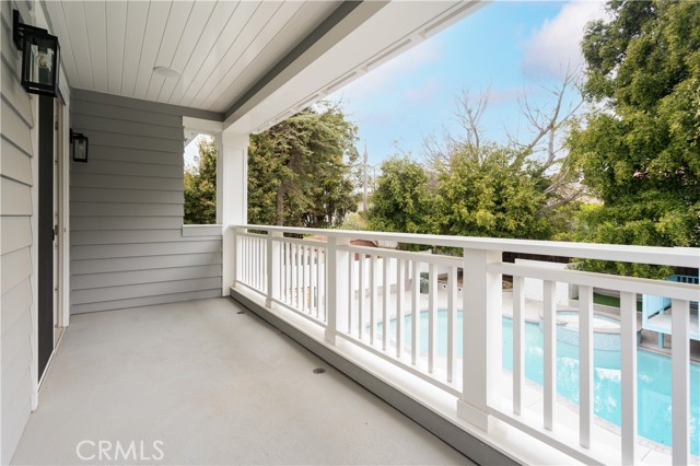 Primary bedroom balcony overlooks the yard!