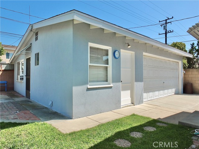 Two car garage with attached laundry & 