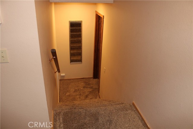 Down Stairs to Primary Bedroom