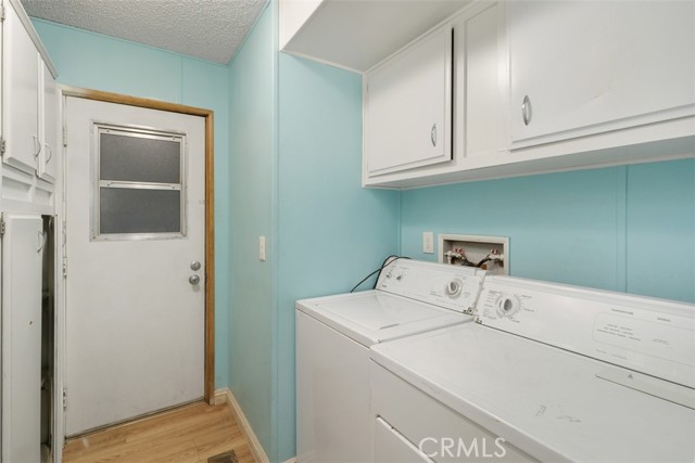 Laundry room w/ washer & dryer