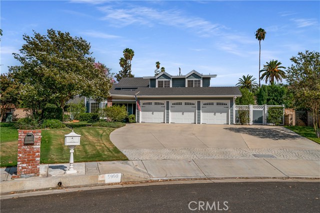 5900 Copperfield Avenue Riverside, California Hawarden Hills Shingle Sided Modified Traditional Home. Unique and open floorplan ideal for large scale entertaining or restful living. Approximately 3,800SF 4 bedroom (small main-floor 4th bedroom converted to a study), 3 bath, large formal living room with fireplace, Music room, large formal dining room. Family room with fireplace and adjacent game room. Massive gourmet kitchen with all custom hardwood cabinetry, two islands, soapstone counter-tops, all Kitchenaid stainless steel appliances including double ovens, dishwasher drawers, 5 burner range with pot filler and hood, wine chiller and "French Door" style refrigerator with matching cabinet panels. Circular breakfast room, walk-in-pantry and large adjacent laundry room. First floor master-suite with fireplace, completely remodeled marble bathroom with soaking tub, walk-in shower, custom vanities and massive one of a kind walk in closet with custom built-ins. Upstairs are two additional large secondary bedrooms and a bath. Travertine, and hardwood flooring throughout. Beautiful mature landscaping provides shade and ambiance to the backyard, a small Meyer Lemon Grove provides privacy to the rear of the lot. Gated access to the Gage canal for walking or jogging. Truly a one of kind residence!