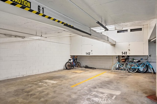 EXAMPLE PHOTO of parking space. 1 space is assigned at a different location.