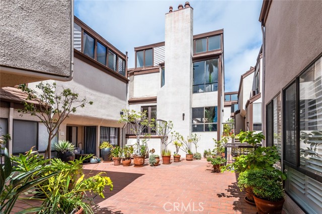 The view looking toward the Unit 3 exterior as seen from the lower courtyard area.