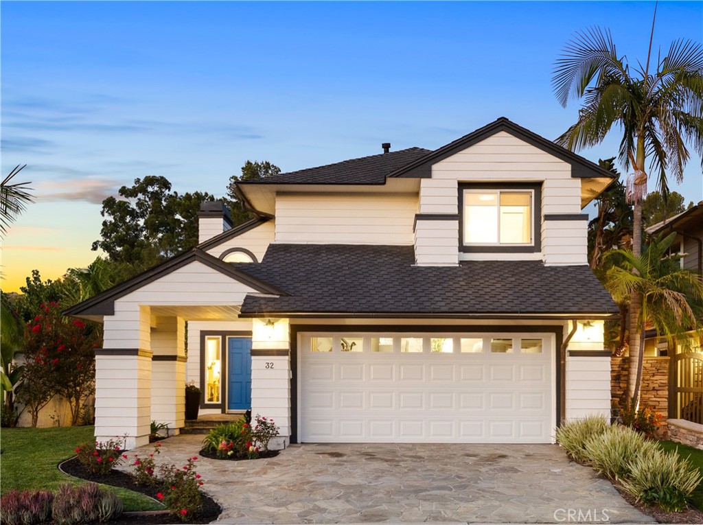 Your search for the finest combination of style and an outstanding location will come to a delightful
end at this completely remodeled coastal home in Laguna Niguel’s enviable Summerwalk enclave. Enhanced by a
premium corner homesite with a pocket park behind it and only one direct neighbor on a cul-de-sac street,
the light and open residence is turnkey and ready to elevate your lifestyle. First impressions are memorable
thanks to manicured landscaping, colorful roses, a custom flagstone driveway with
matching walkway and porch, a new roof, fresh paint and even a classic weathervane. The backyard is a
private resort that fosters memorable gatherings in and around a saltwater PebbleTec pool and spa with
spillways and color-changing LED lighting, a built-in concrete BBQ bar with seating and pergola, a side patio
and two open-air fireplaces. A small red wine vineyard and fragrant fruit trees frame the backyard, offering
fresh pomegranates, apricots, plums, cherries, peaches, figs, lemons, passion fruit, avocado and pears when ripe. Inviting living spaces continue indoors throughout an open-concept floorplan that reveals three bedrooms and two- and one-half baths in approximately 1,881 square feet. The first level
offers a great flow for entertaining, with a vaulted ceiling soaring over the entry and fireplace-warmed living
room, a formal dining room opening to side yard through French doors, and a family room with sliding-glass door accessing the
backyard. The fashionable new kitchen shines with white custom cabinetry, on-trend brass hardware, a
waterfall-edge peninsula with bar seating, and quartz countertops, glass-tile backsplash, and
stainless steel KitchenAid appliances. Tranquil tree and hill views are enjoyed from an elegant primary suite
that hosts a vaulted ceiling, two walk-in closets, a jetted tub, walk-in shower, and white stone surrounds.
New upgrades include white oak flooring throughout, new windows and doors, a new roof, new A/C and furnace and smart-home tech. Residents of Summerwalk appreciate the nearby dog park and direct access to community trails that
lead to the beach, which is less than four miles from the community. Outstanding schools, abundant parks and shopping
centers, popular restaurants and more are all just minutes away. Your search for the finest combination of style and an outstanding location will come to a delightful
end at this completely remodeled coastal home in Laguna Niguel’s enviable Summerwalk enclave. Enhanced by a
premium corner homesite with a pocket park behind it and only one direct neighbor on a cul-de-sac street,
the light and open residence is turnkey and ready to elevate your lifestyle. First impressions are memorable
thanks to manicured landscaping, colorful roses, a custom flagstone driveway with
matching walkway and porch, a new roof, fresh paint and even a classic weathervane. The backyard is a
private resort that fosters memorable gatherings in and around a saltwater PebbleTec pool and spa with
spillways and color-changing LED lighting, a built-in concrete BBQ bar with seating and pergola, a side patio
and two open-air fireplaces. A small red wine vineyard and fragrant fruit trees frame the backyard, offering
fresh pomegranates, apricots, plums, cherries, peaches, figs, lemons, passion fruit, avocado and pears when ripe. Inviting living spaces continue indoors throughout an open-concept floorplan that reveals three bedrooms and two- and one-half baths in approximately 1,881 square feet. The first level
offers a great flow for entertaining, with a vaulted ceiling soaring over the entry and fireplace-warmed living
room, a formal dining room opening to side yard through French doors, and a family room with sliding-glass door accessing the
backyard. The fashionable new kitchen shines with white custom cabinetry, on-trend brass hardware, a
waterfall-edge peninsula with bar seating, and quartz countertops, glass-tile backsplash, and
stainless steel KitchenAid appliances. Tranquil tree and hill views are enjoyed from an elegant primary suite
that hosts a vaulted ceiling, two walk-in closets, a jetted tub, walk-in shower, and white stone surrounds.
New upgrades include white oak flooring throughout, new windows and doors, a new roof, new A/C and furnace and smart-home tech. Residents of Summerwalk appreciate the nearby dog park and direct access to community trails that
lead to the beach, which is less than four miles from the community. Outstanding schools, abundant parks and shopping
centers, popular restaurants and more are all just minutes away.