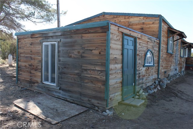 Side view of house left side along workshop