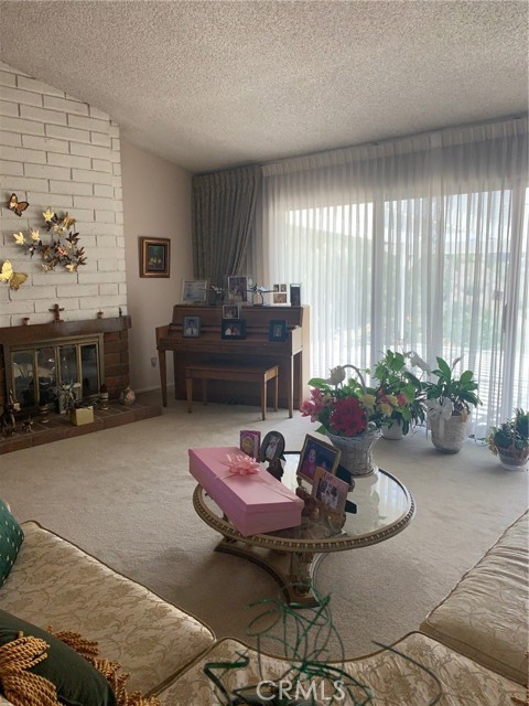 LIVING ROOM W FIREPLACE AND WET BAR