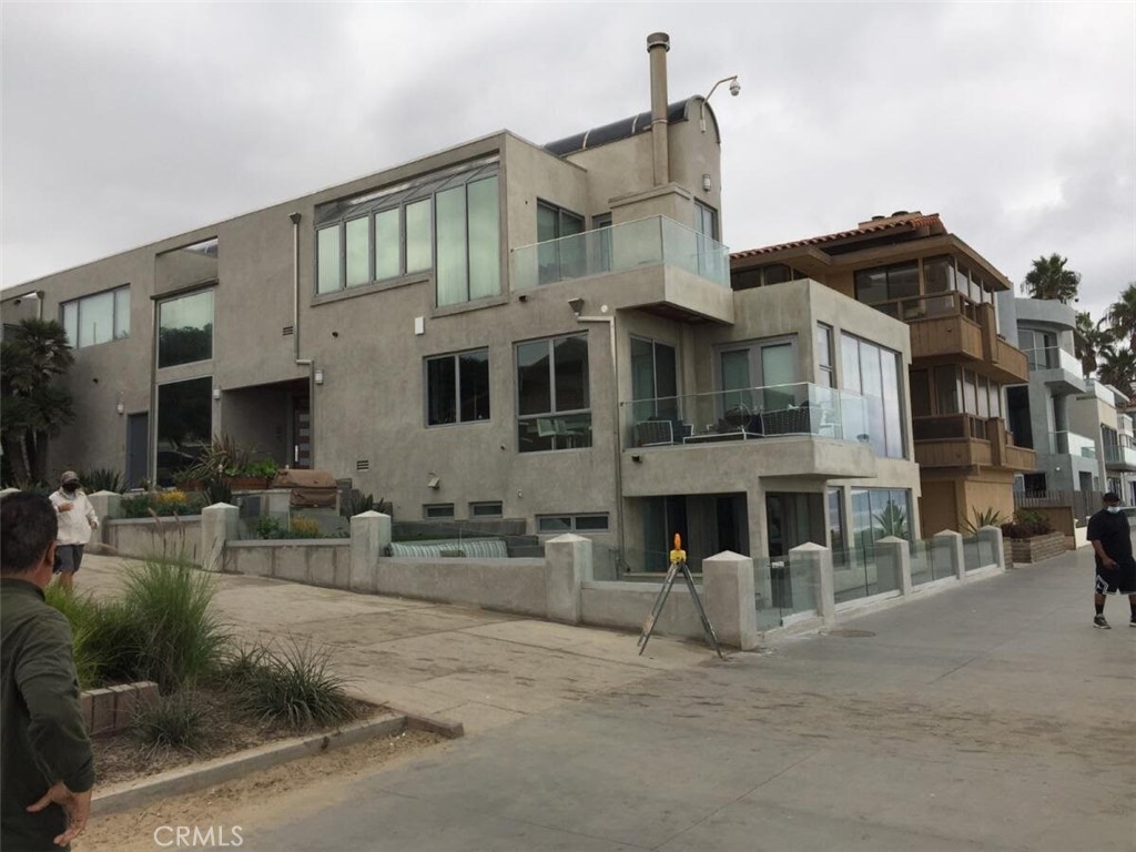 Welcome to 2522 The Strand, a stunning oceanfront townhome located in the heart of Manhattan Beach. This modern contemporary home offers 3 bedrooms, 3 and a half bathrooms, and 2,740 square feet of luxurious living space. With panoramic ocean views stretching from Catalina to Malibu, this property is truly one of a kind.

As you enter the home, you'll be greeted by a spacious living area that is bathed in natural light. The living room features floor-to-ceiling windows that offer breathtaking ocean views. The kitchen is a chef's dream, with Italian cabinetry and all Thermador appliances, including a state-of-the-art oven. The entire home is equipped with smart home technology, which allows you to control everything from the lighting and sound to the temperature and blinds using an iPad or smartphone.

The home boasts three private decks, where you can relax and take in the stunning ocean views. The master suite is a luxurious retreat, featuring a 73 inch soaking tub and a ThermaSol steam shower with aromatherapy. The lower level of the home includes an additional bedroom and bathroom, perfect for guests or as an office. There is even a 450-bottle wine room, perfect for storing your collection.

Located just steps from the ocean, this home offers the perfect beachside lifestyle. It's just a 5-minute bike ride to downtown shopping and dining, where you'll find some of the best restaurants and boutiques in Manhattan Beach. Don't miss your chance to own this incredible oceanfront property.