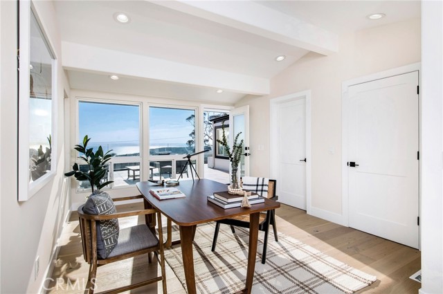 Features a bedroom that opens to a large ocean-view deck.