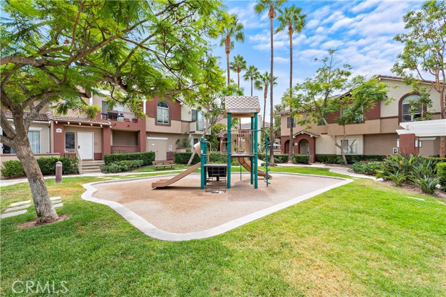 HOA Amenities include a Pool, Spa and Playground Courtyard -- This home looks out onto this grassy courtyard - No one in front of you, just a nice view of this playground courtyard