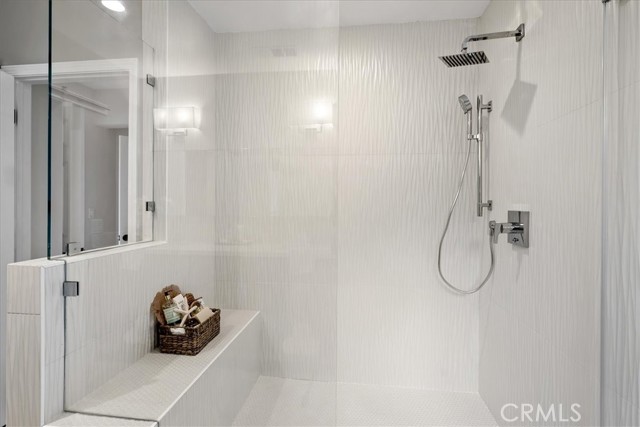 Master shower elegantly newly transformed to a spa like experience.