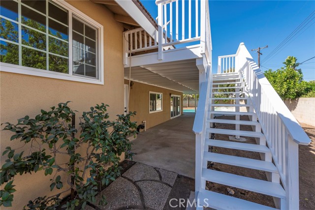 Stairs leading to deck from backyard