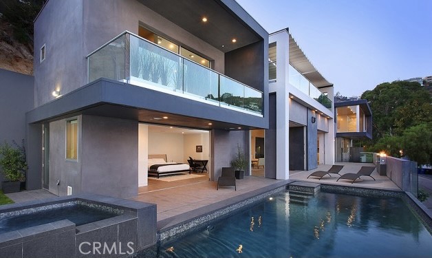 1489 Stebbins Los Angeles, California Sweeping panoramic views of LA's city lights, and only minutes from Sunset Plaza. This stately, custom built home does not disappoint. Striking architecture combined with automatic controls for the stereo system, pool, & fireplace will leave you worry free while entertaining guests. Slide the luxurious pocket doors back, and take in the indoor-outdoor livability of Cali's climate year round. Sit by the fire and enjoy pre-dinner cocktails on the deck, or take a dip in the saltwater infinity pool. The entertainment possibilities for this home are endless and it's just a stone's throw from LA's hotspots off the strip.