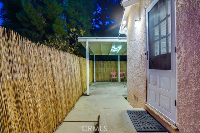 Side of house with separate kitchen entry