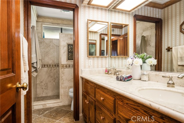 Elegant Bathroom with Dual Sinks and Walk-In Shower