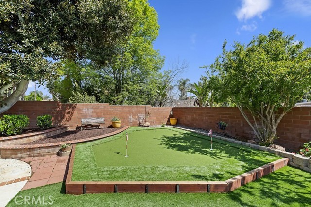 putting green and 
pomegranate tree